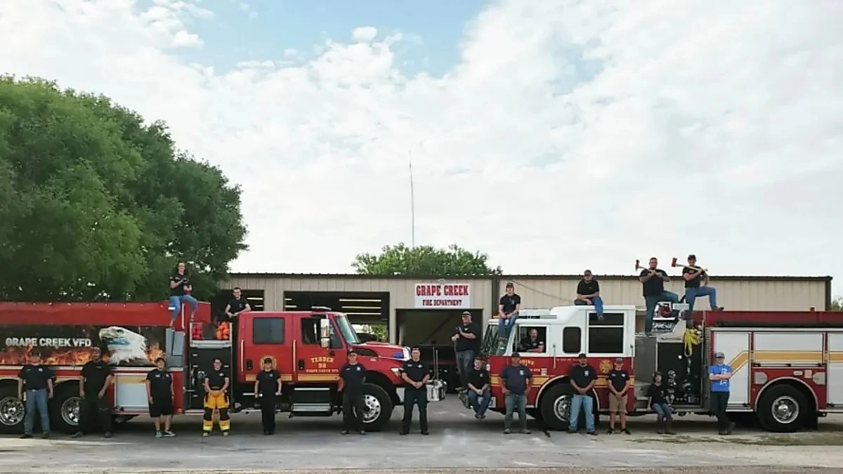 Grape Creek volunteers with their fire apparatus in front of the Wren Road station